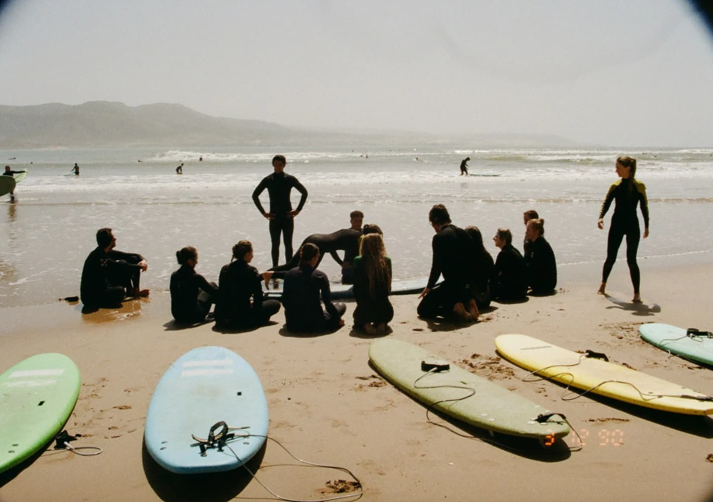 Beach surf lesson circle at Aman Surf & Yoga in Imsouane, Morocco