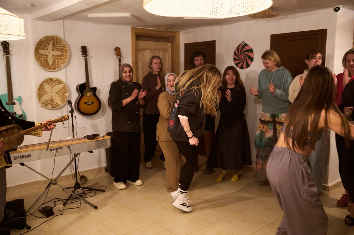 Dancing at retreat music night at Aman Surf & Yoga in Imsouane, Morocco