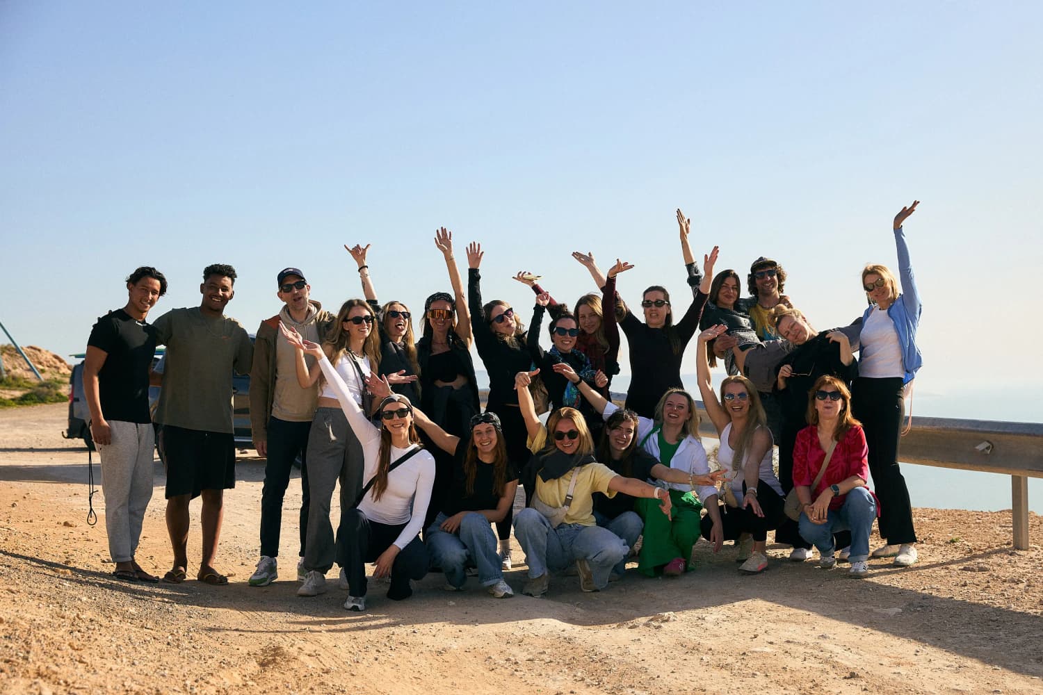 Aman Surf & Yoga retreat guests together on the coast of Imsouane