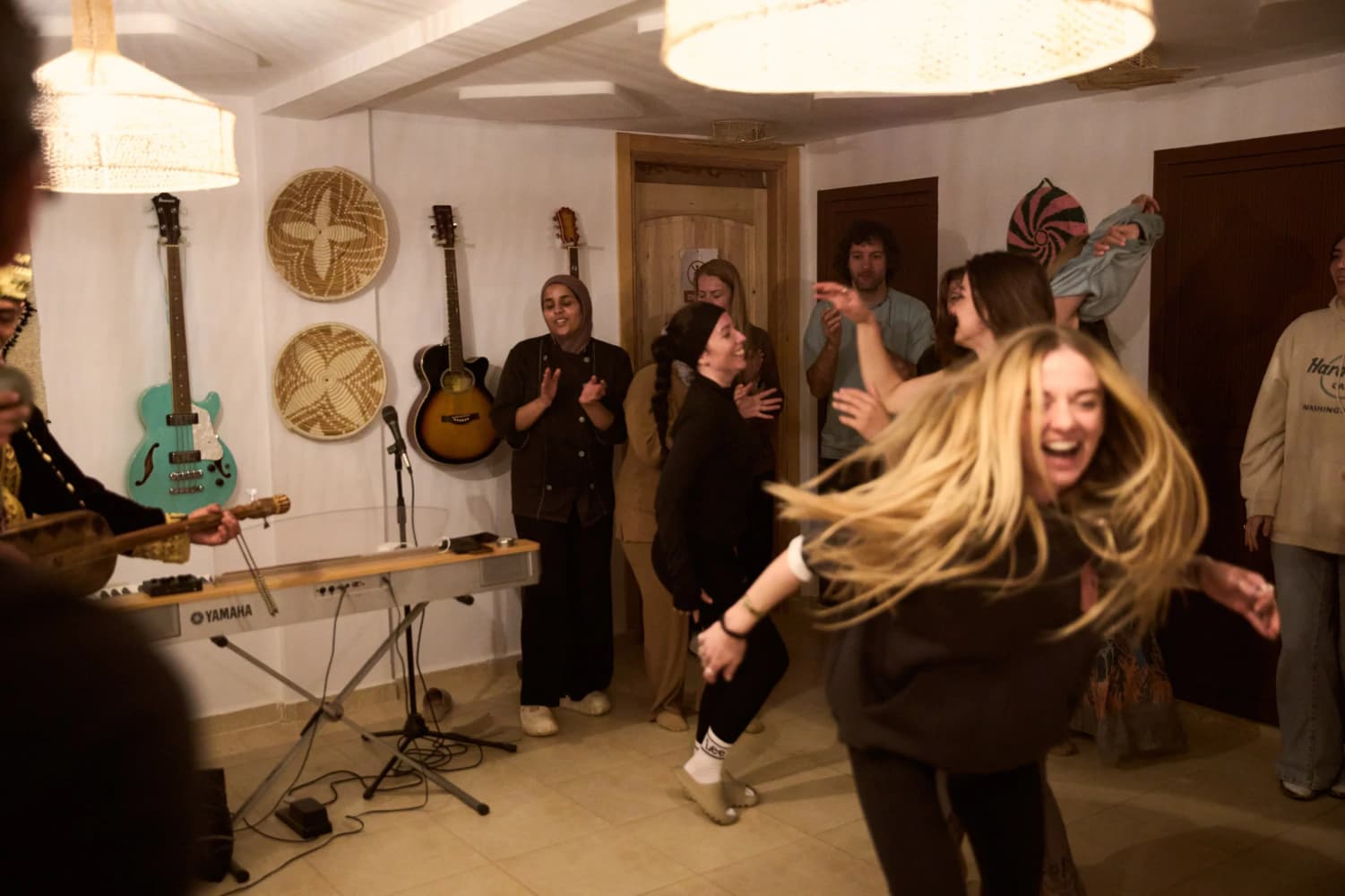 Joyful dance at live music night at Aman Surf & Yoga in Imsouane, Morocco
