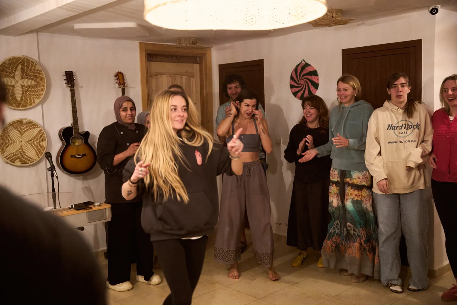Retreat guests gathered for music at Aman Surf & Yoga in Imsouane, Morocco