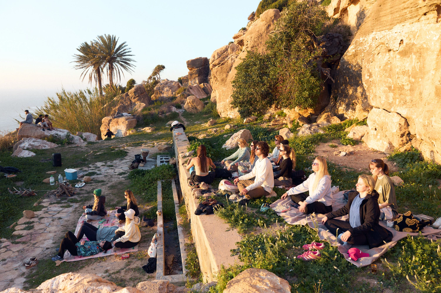 Outdoor wellness session beside the cliffs